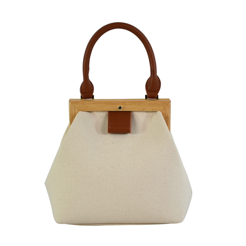 美国PU拼接帆布袋手提斜跨两用手挽加印logo图案家居ins