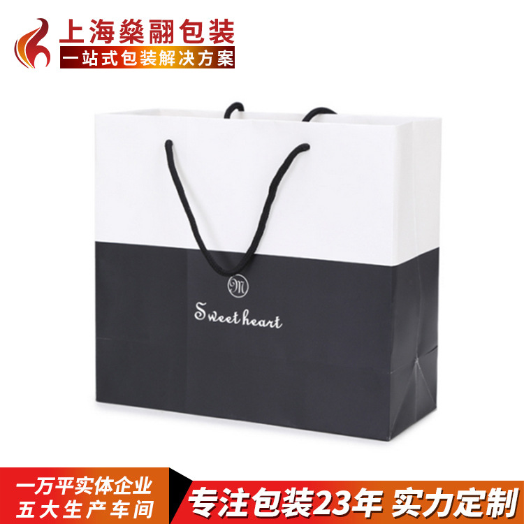 定制简约白卡纸手提袋创意折叠购物服装礼品牛皮纸袋定做logo