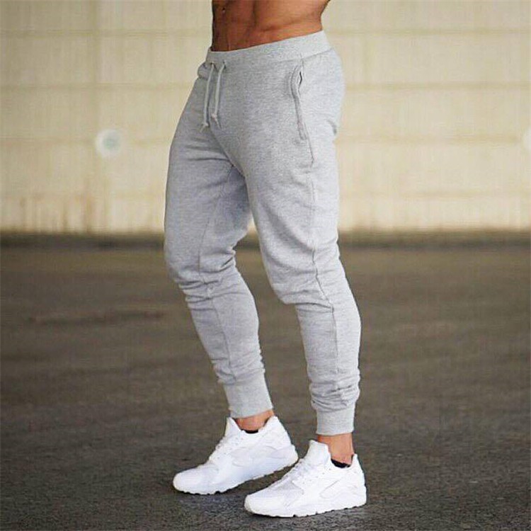 Pantalones deportivos pantalones de correr para hombres pantalones de entrenamiento de fútbol de fitness Pantalones deportivos casuales delgados europeos y americanos pantalones de hombres flacos para hombres