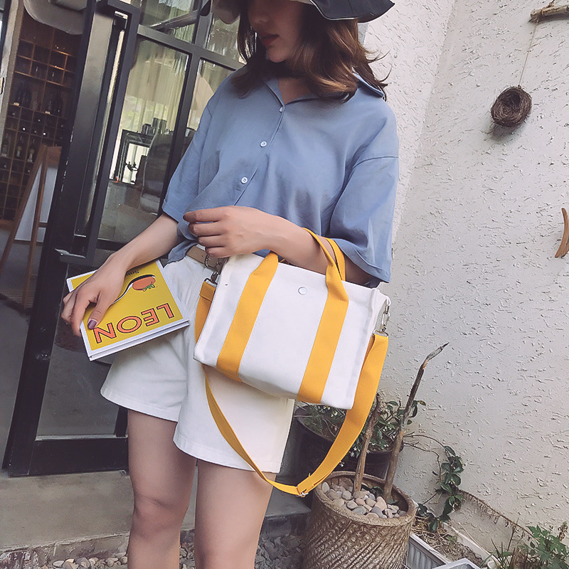 织带小方包模特