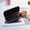Big handheld black glasses solar-powered, fashionable fresh sunglasses suitable for men and women, storage box, simple and elegant design