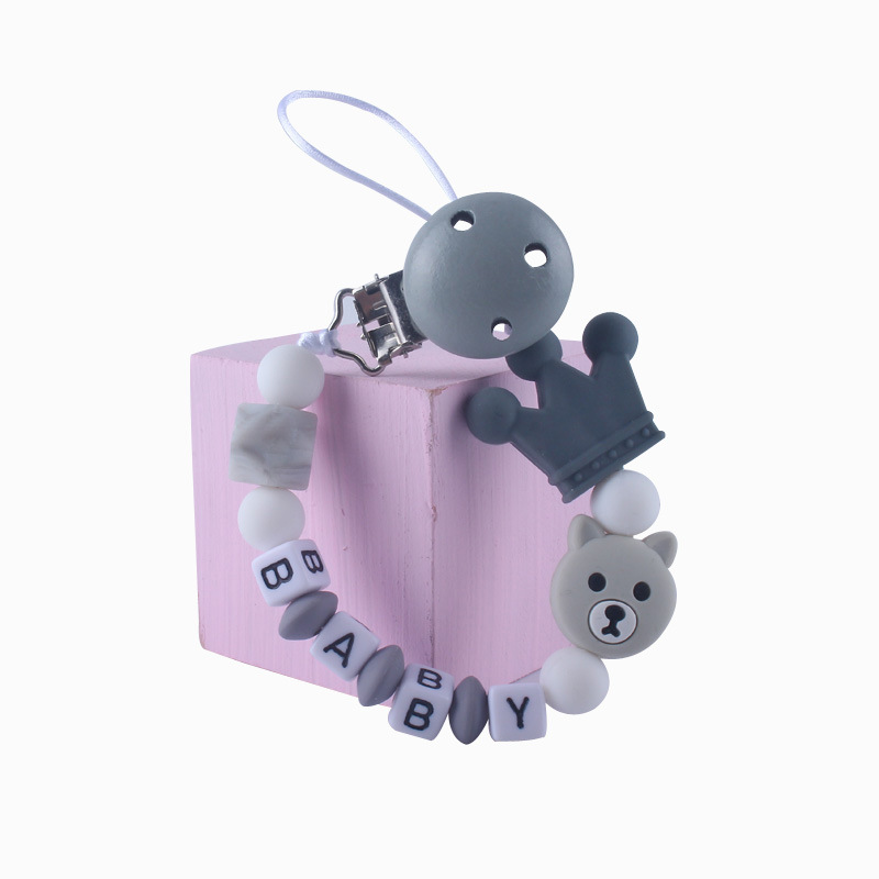 Patrón de dibujos animados de bebé de silicona chupete Cadena de dientes de bebé Cadena de molienda chupete cadena anti-caída comercio exterior