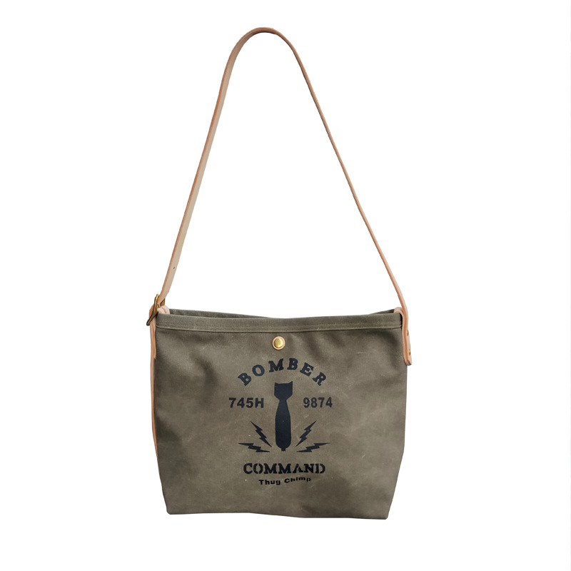 阿美咔叽复古水洗做旧帆布包军事工业风植鞣革手工单肩斜挎包