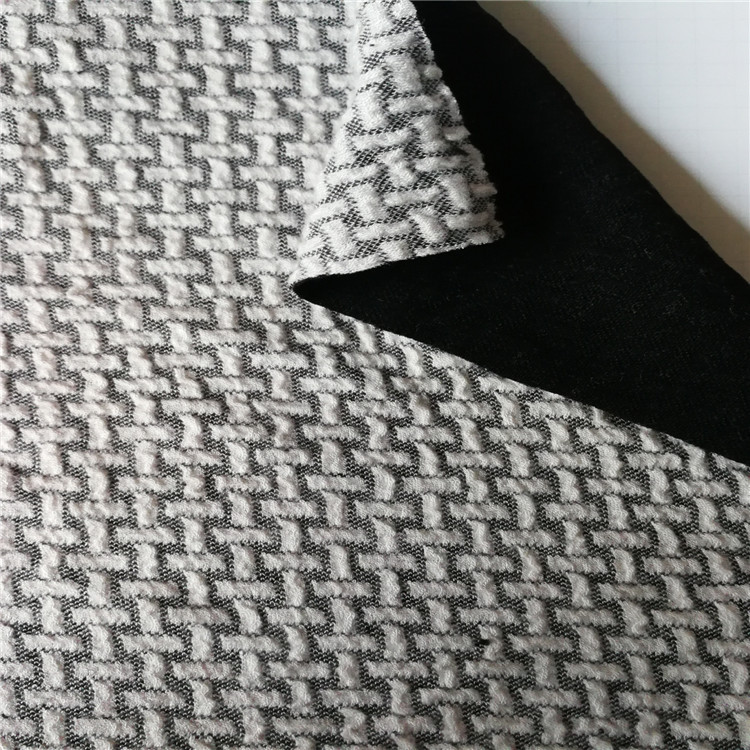 涤盖棉提花空气层针织布，床上用品提花面料 女款时装服装面料