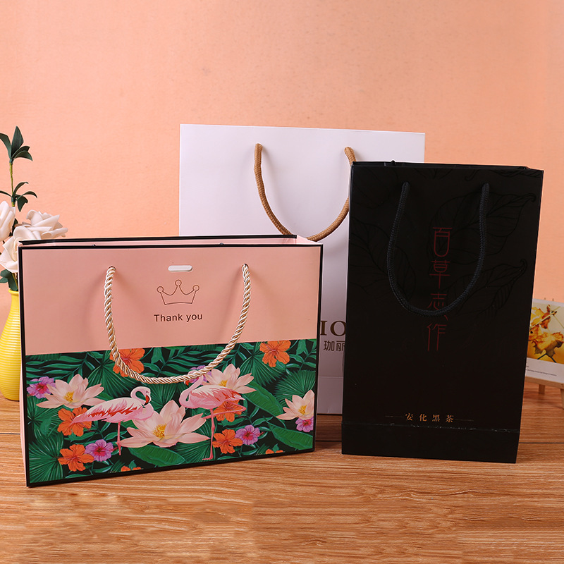 定做礼品服饰包装纸袋白卡纸手提袋 图案logo设计定制厂家直供