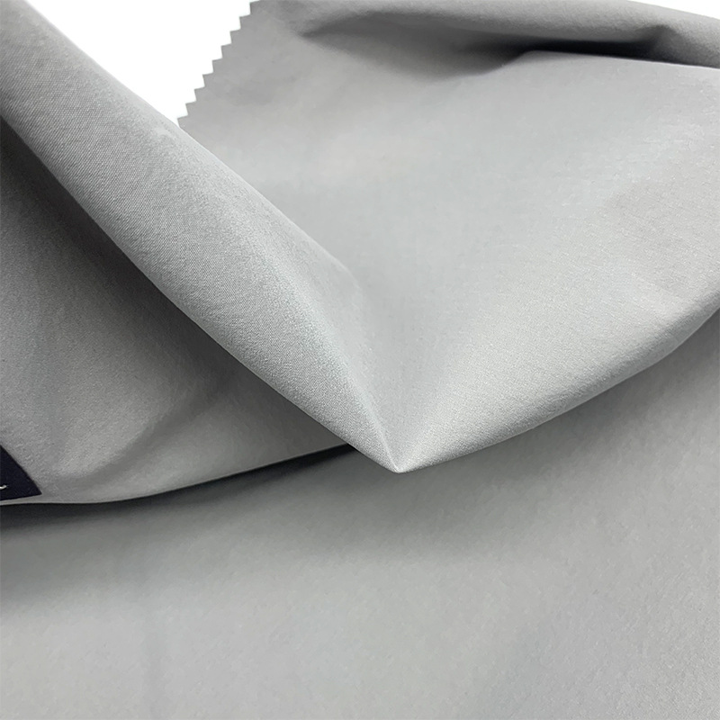 厂家直供酷丝棉T400弹力混纺平纹酷丝棉风衣夹克酷丝绵制服面料