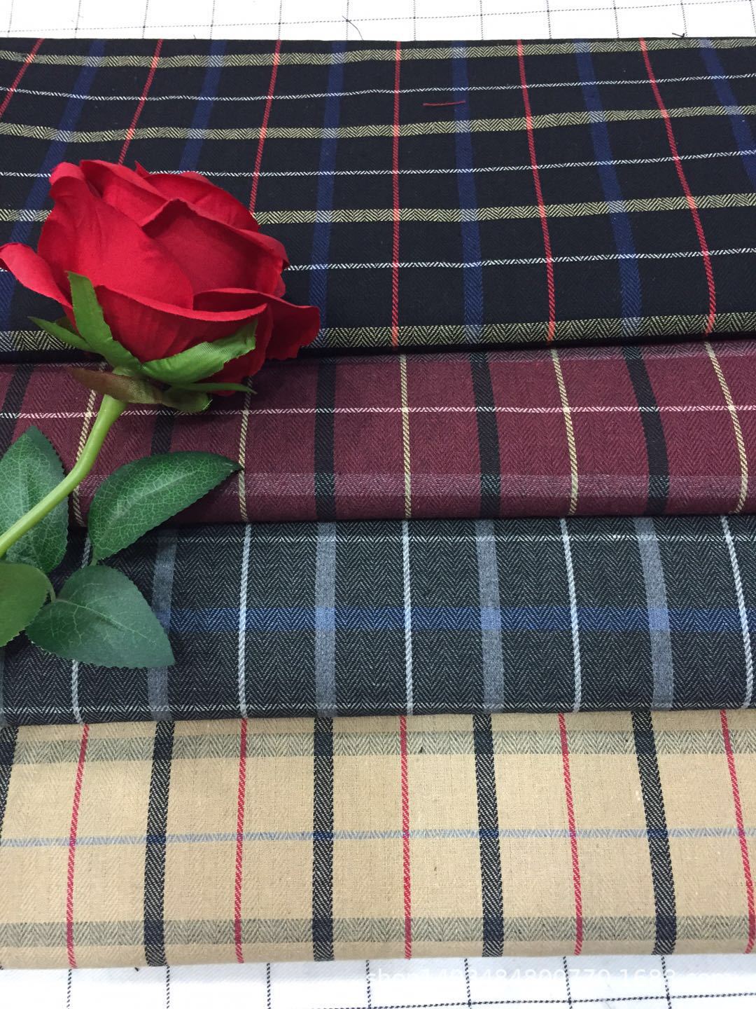 21支色织梭子涤棉混纺面料男装童装秋冬长款衬衫面料现货供应厂家