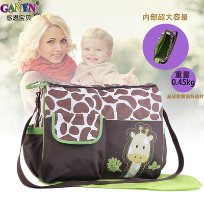 源頭廠家可定制卡通頭像斜跨手提媽咪包耐髒大容量幹濕分區母嬰包