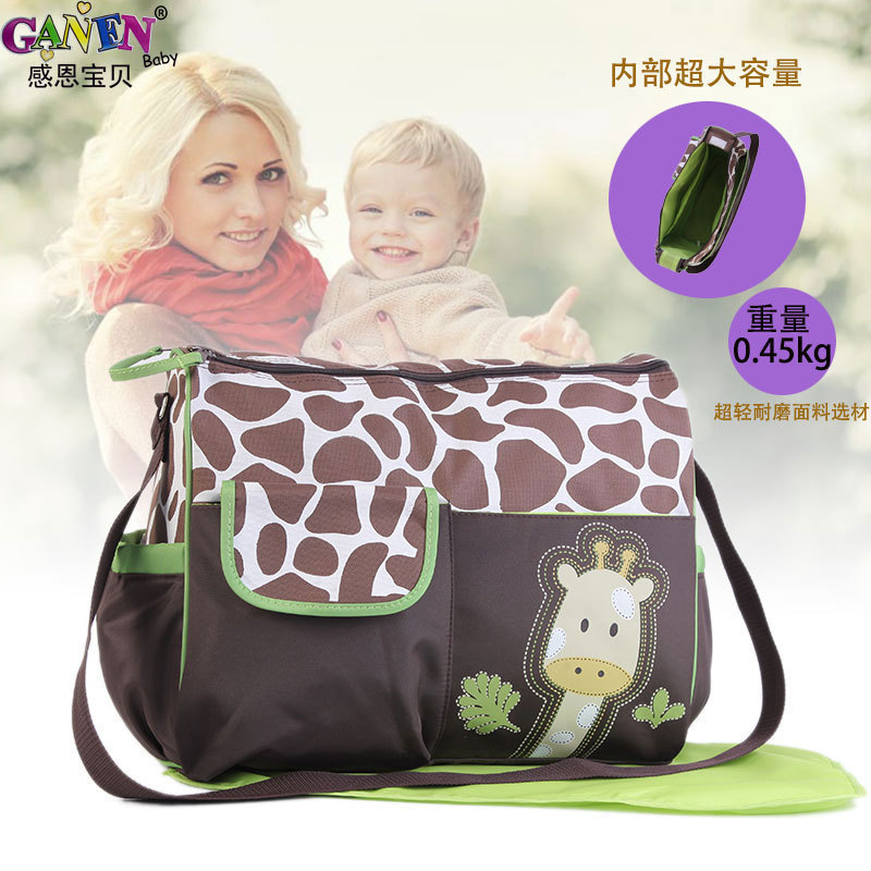 源頭廠家可定制卡通頭像斜跨手提媽咪包耐髒大容量幹濕分區母嬰包