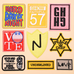 New minimalist fabric patches, trendy embroidered badges, down jacket patches, and pants decorations—factory direct sales with small-batch wholesale options.