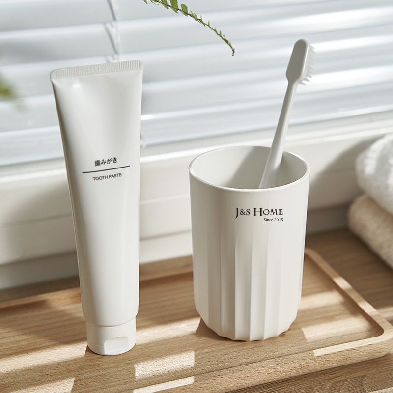 Estilo nórdico simple cepillo de dientes taza baño pareja onda patrón de plástico cepillo de dientes de almacenamiento taza de lavado simple