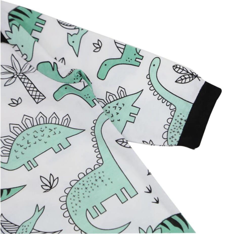 INS Otoño e Invierno nuevos niños bebé saco de dormir de manga larga dinosaurio IMPRESIÓN + sombrero 2-piezas conjunto AC016A