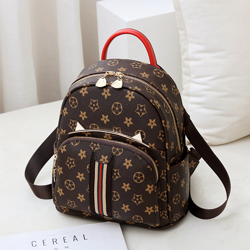 Shoulder bag Korean version 2021 new pattern PU Little bag lady Mini fashion printing Hit color knapsack On behalf of