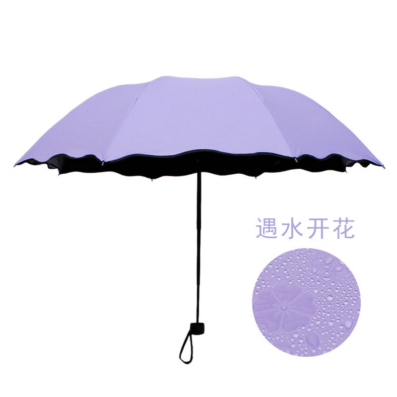 戶外三折女士遮陽傘創意黑膠遇水開花防曬防紫外線三折傘現貨批發
