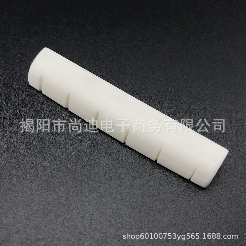 MI0464-Bone Gutiar Bridge Nut