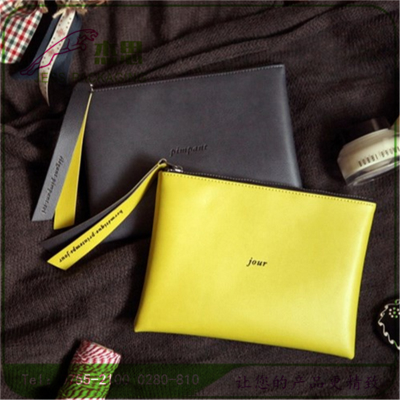 设计新款双面皮拉链收纳包大容量随身携带休闲手提皮包量大从优