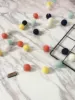 Wool ball skewers: Tibetan green+white+blue+yellow+orange