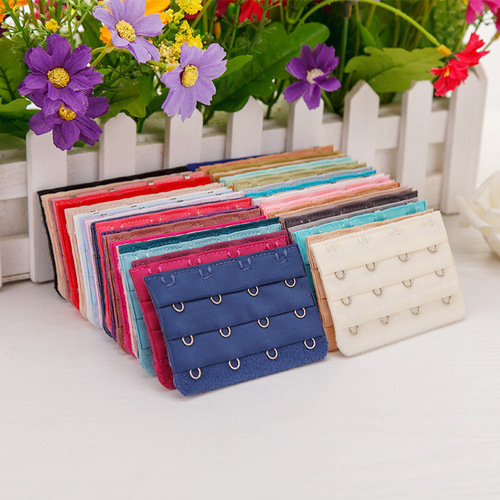 Three rows and four buttons stainless steel bra back buckle Three rows and four buttons bra extension buckle Unpackaged bra extension buckle