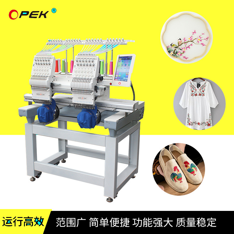 2 head new embroidery machine, 12 needle...