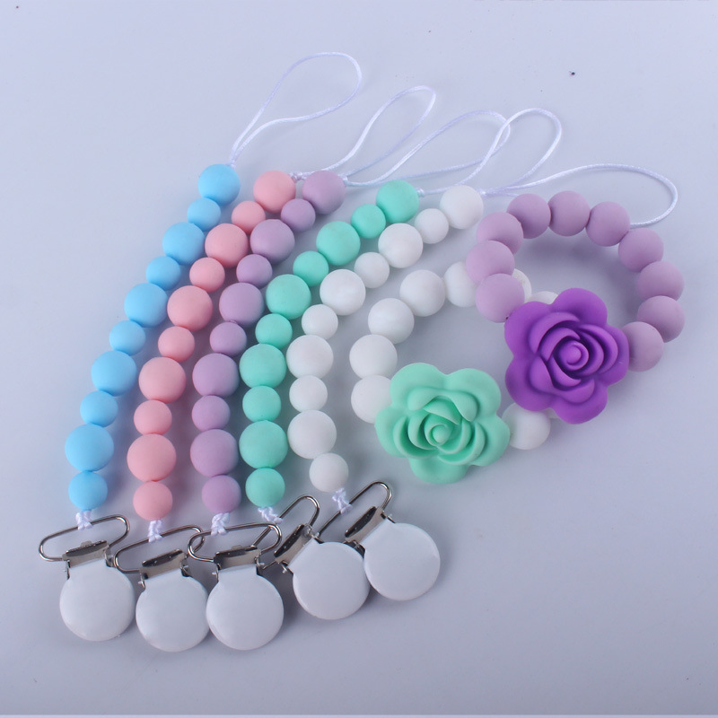 Productos del bebé silicona teether bebé flor dibujos animados silicona juguete teether chupete traje