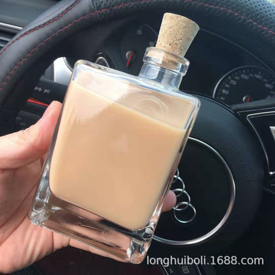 新款 精白料玻璃奶茶瓶 香水果酒红酒白酒瓶 晶白料歪嘴饮料瓶