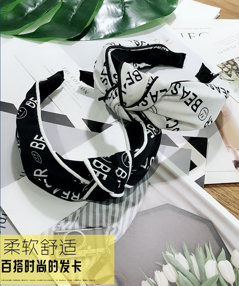 Korean Fashion Wide-brimmed Letter Printing Clip Knotted Headband High-end Wild Fashion Hairpin Temperament Hair Headband Ladies Wholesale Nihaojewelry display picture 2