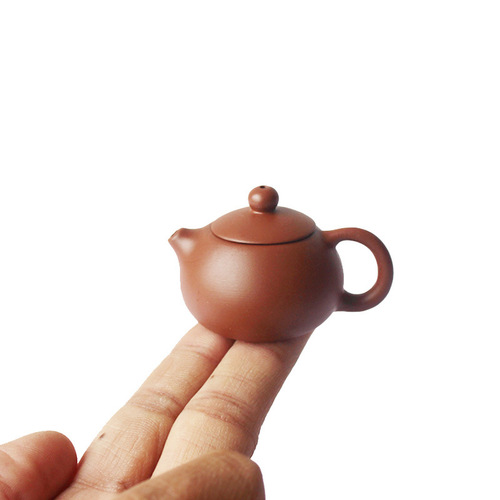 Mini purple clay pot handmade creative small pocket fingertip pot small tea play tea pet ornaments Kung Fu tea set can be raised