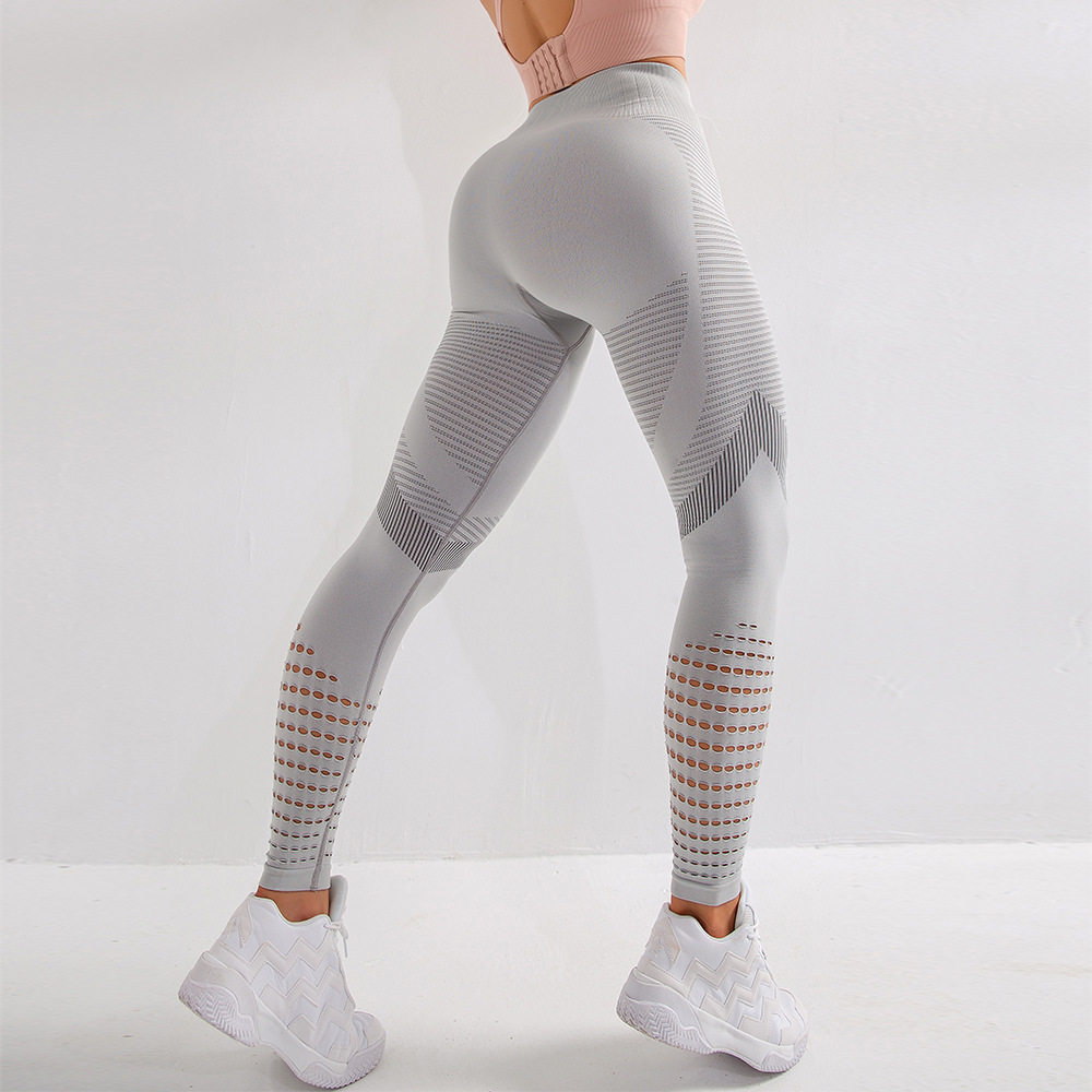 Pantalones de yoga de color sólido ajustados de cintura alta con huecos de alta elasticidad para levantamiento de cadera NSYWH127910