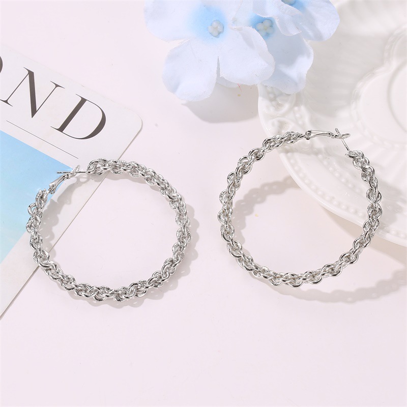 New Creative Woven Design Alloy Exaggerated Big Circle Twist Earrings Wholesale display picture 6