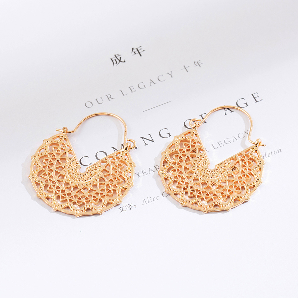 Retro Alloy Hollow Semicircular Carved Earrings Wholesale display picture 3