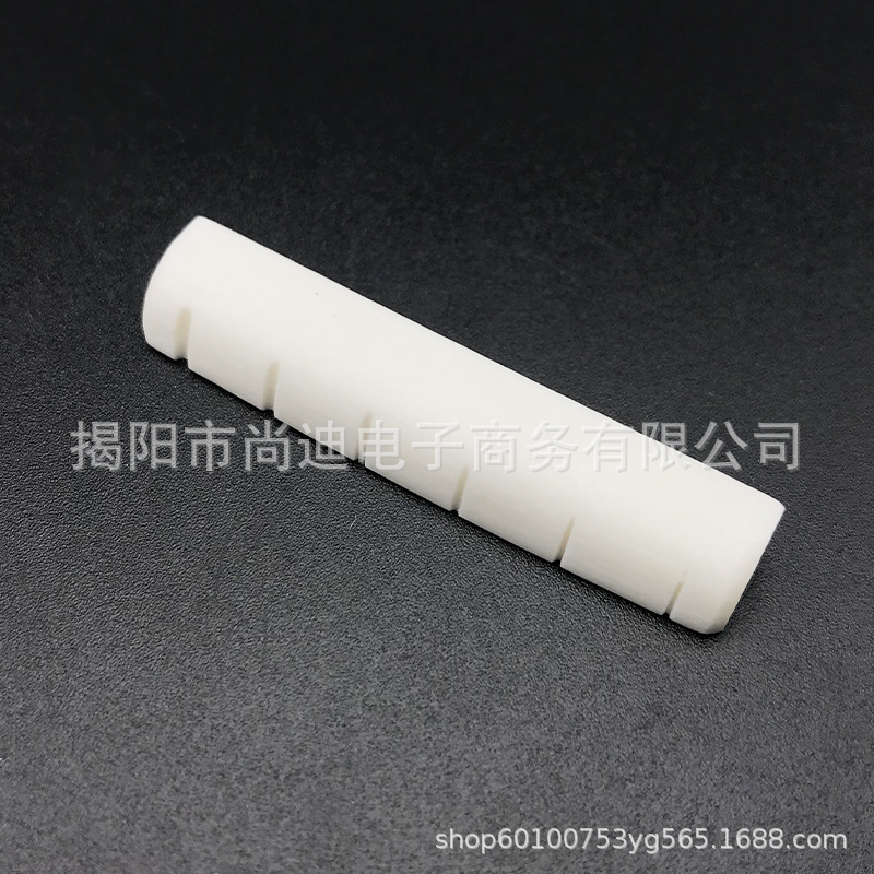 MI0464-Bone Gutiar Bridge Nut