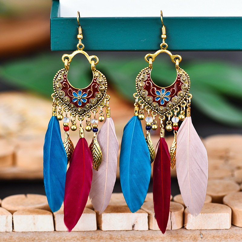 Creative Retro Fan-shaped Oil Drop Small Flower Tassel Feather Long Earrings display picture 4