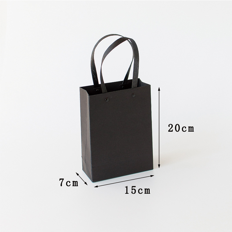 Solid color rivet gift bag-black trumpet; White cardboard; Figure