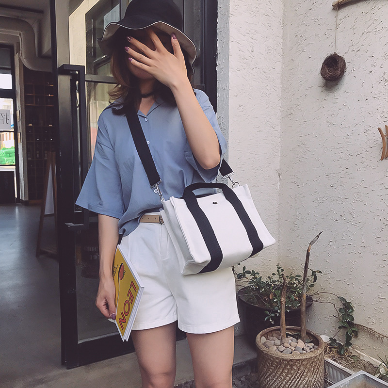 织带小方包模特