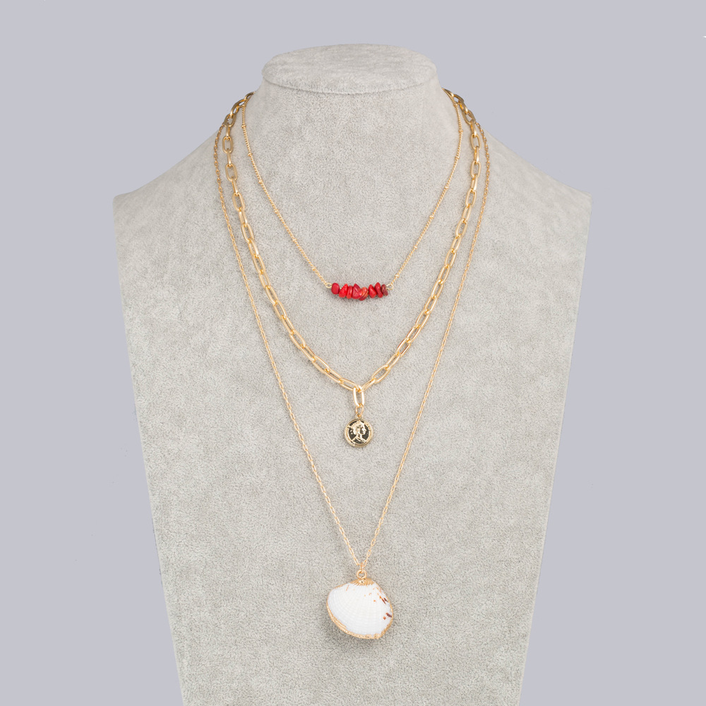 Mode Koralle Stein Schlüsselbein Kette Goldmünze Naturschale Anhänger Mehrschichtige Legierung Halskette Für Frauen display picture 3