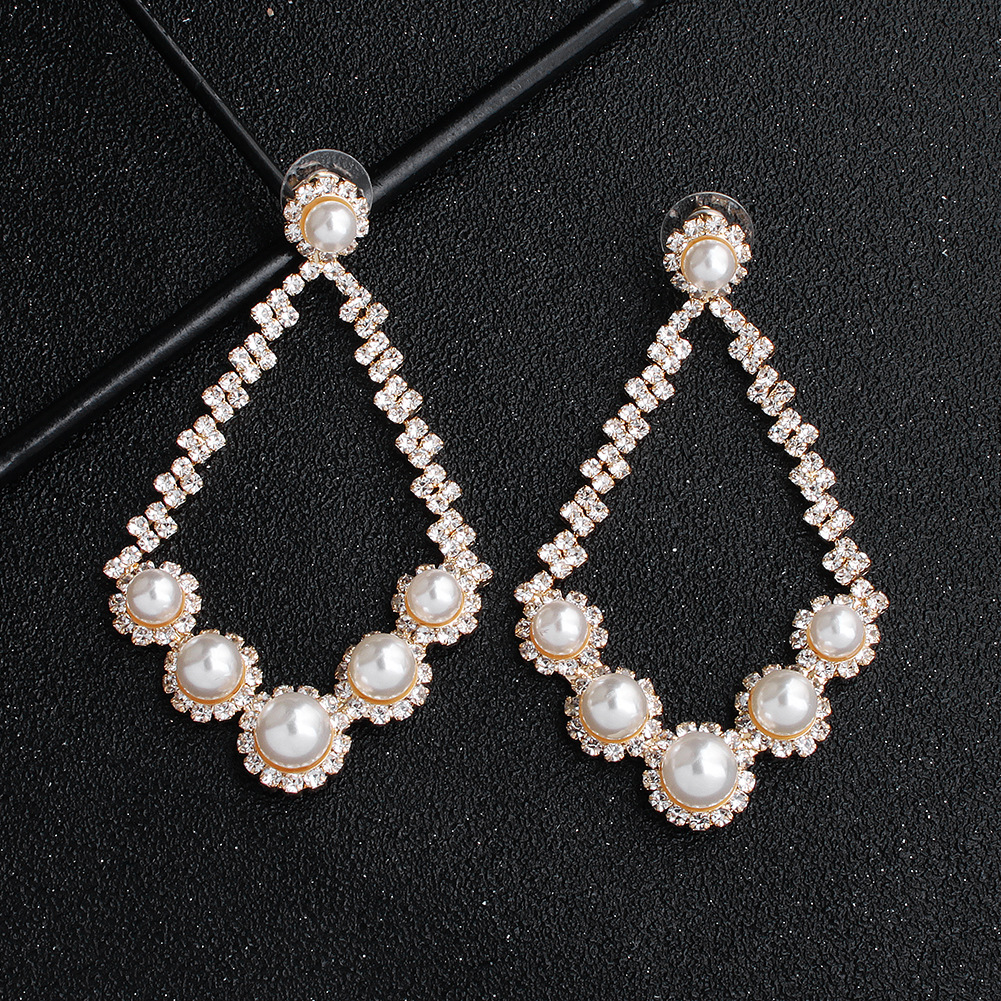 Fashion New Exaggerated Big-brand Trend Banquet Sexy Pearl Diamond Earrings display picture 3