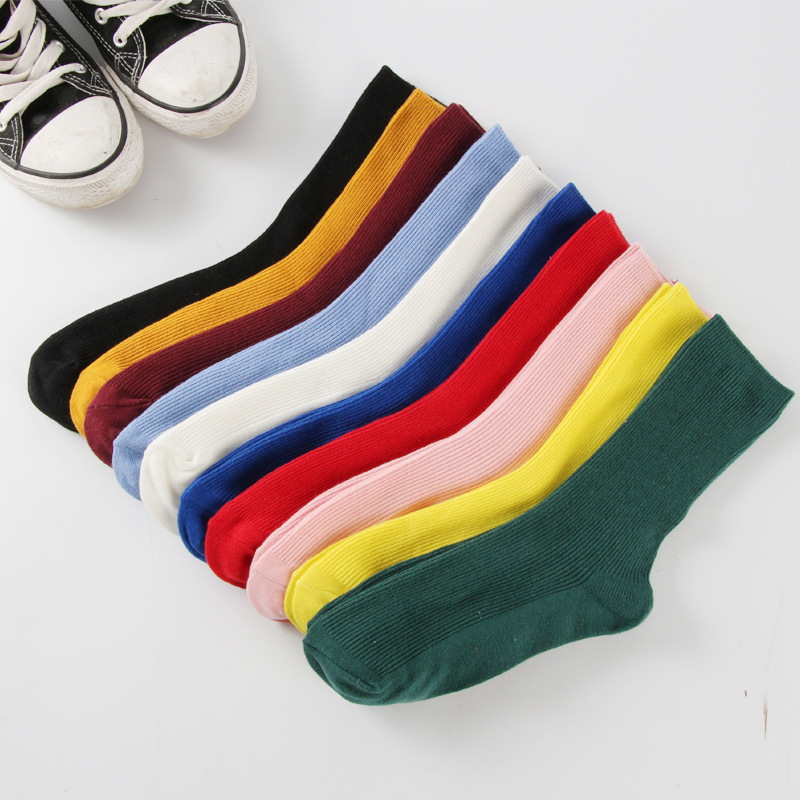 Socks female autumn and winter pure color thin strip stacks Japanese net red ladies cotton in the socks socks in wholesale