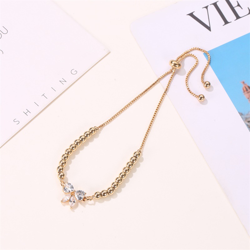 Korean New Fashion Literary Sweet Beaded Adjustable Micro-set Zircon Bow Bracelet display picture 4