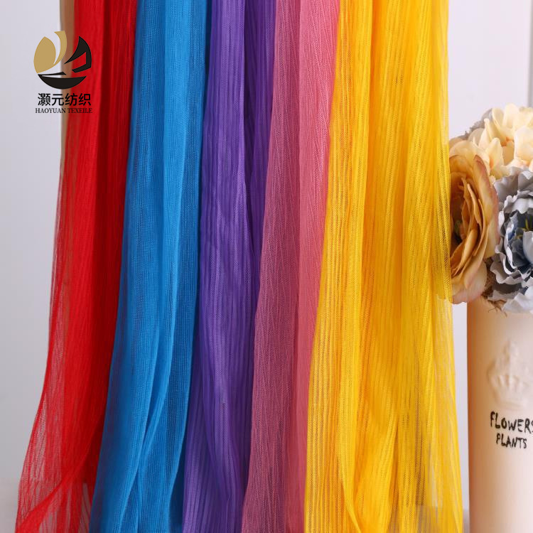 Fabricante de poliéster pliegue tela de malla hexagonal para niñas vestido de boda tela de malla
