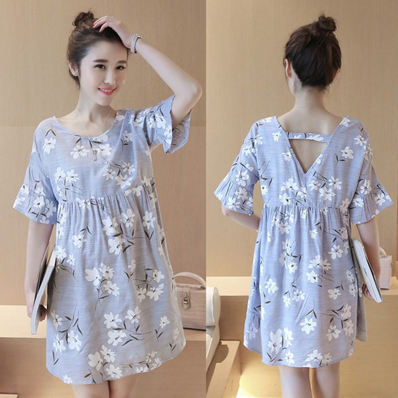 孕妇装胖mm棉麻连衣裙200斤喇叭袖孕妇裙子碎花v领露背潮