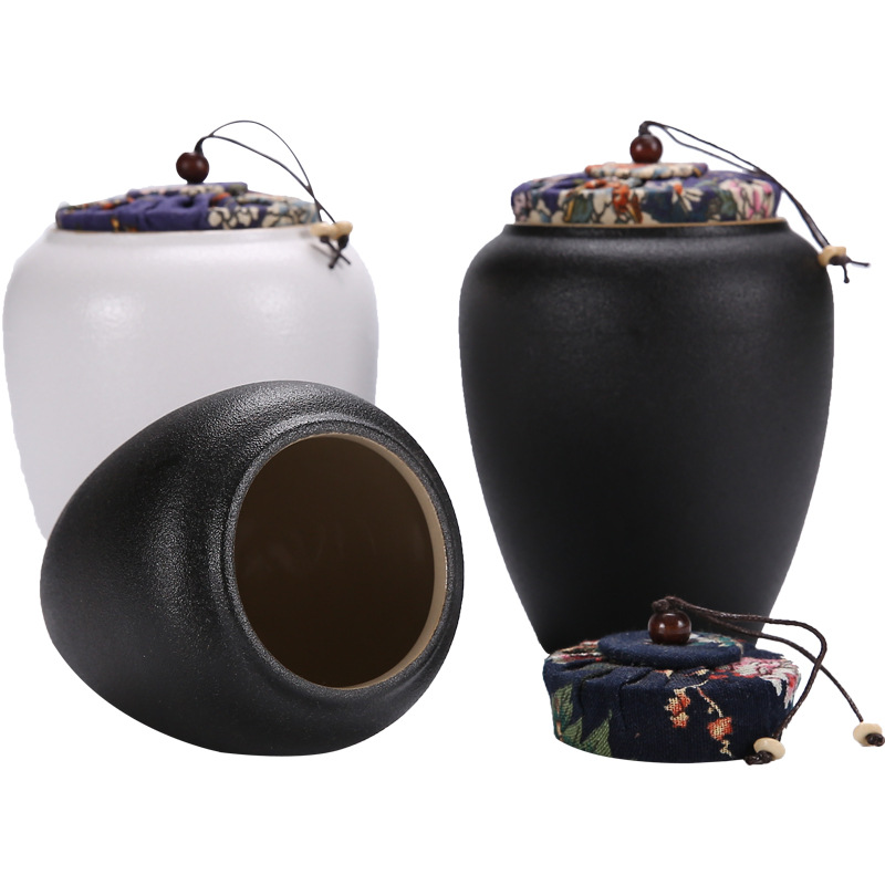 Fábrica al por mayor de cerámica tetera sellada tarro pequeño tamaño hogar almacén de té portátil juego de té pequeño tetera personalización