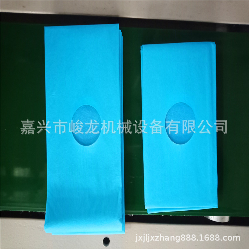 全自动无纺布复合膜贴标不干胶手术洞巾铺单折叠机 打孔医疗床单