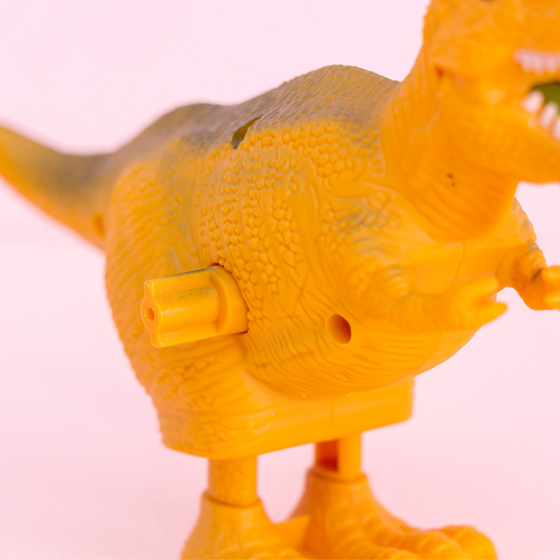 Primavera de juguete de dinosaurio de plástico salto de dinosaurio premio de kindergarten para niños pequeño regalo de la escuela regalo del Día de los niños