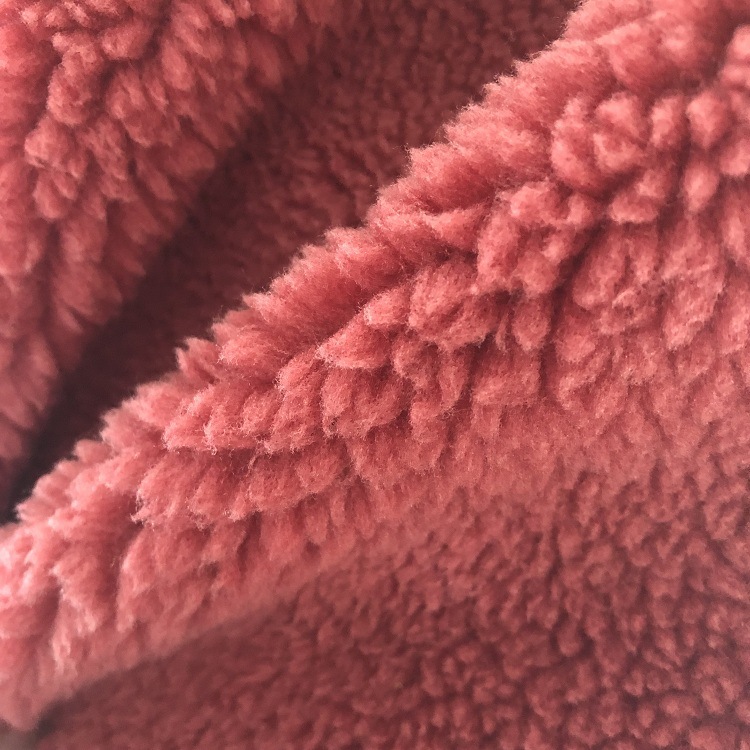 优质冰岛绒 冬季热销款仿羊羔毛 全涤纬编面料颗粒羊绒面料