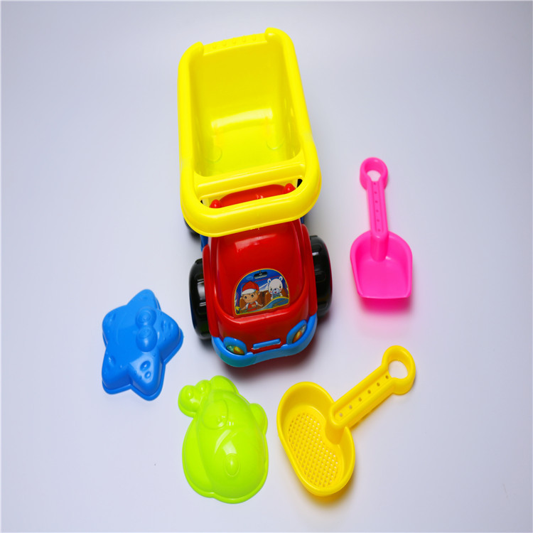 Summer beach toy car playing with sand play in water