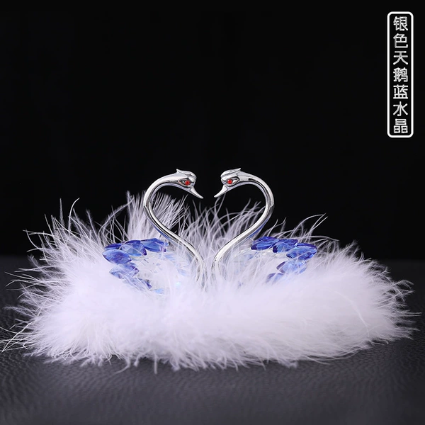 Silver swan + blue crystal + feathers