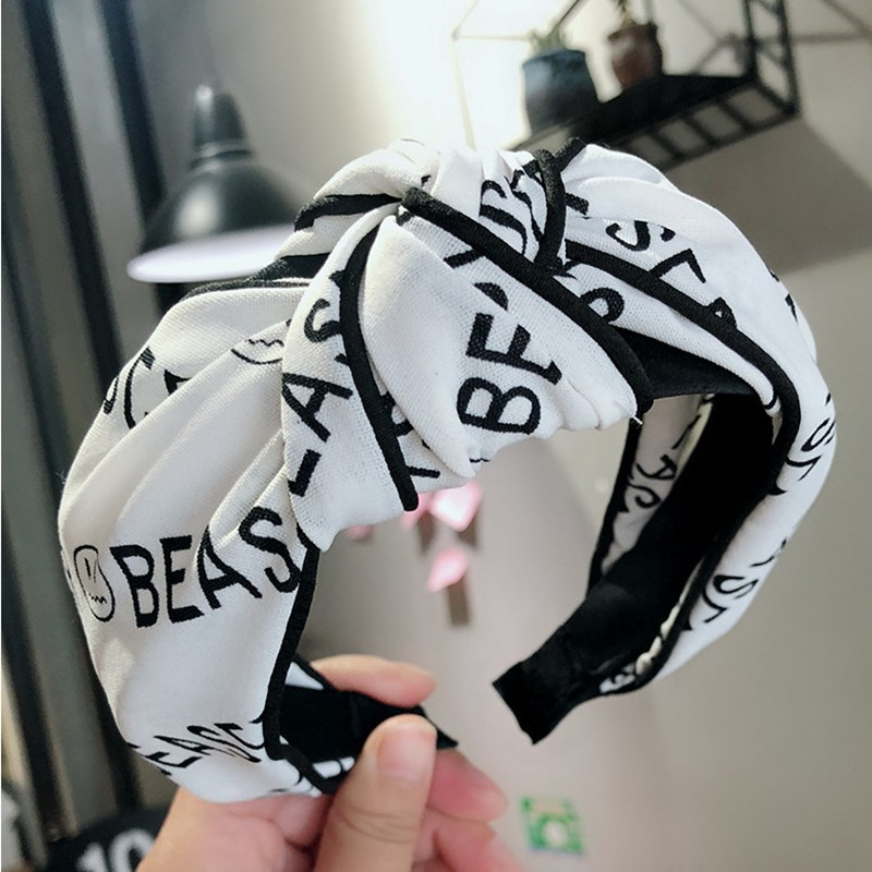 Korean Fashion Wide-brimmed Letter Printing Clip Knotted Headband High-end Wild Fashion Hairpin Temperament Hair Headband Ladies Wholesale Nihaojewelry display picture 4