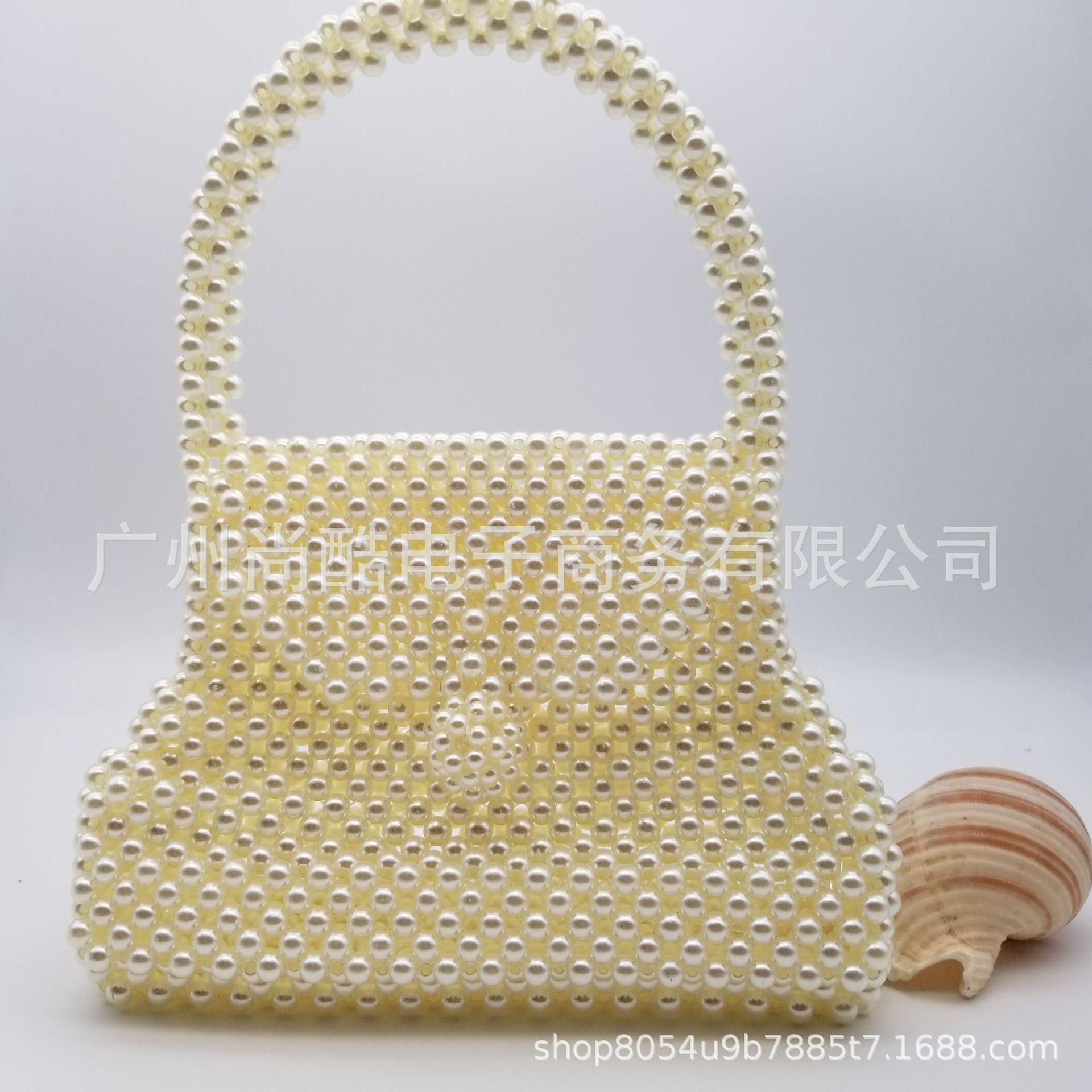 2019夏季新款女包韩国迷你手工珍珠包编织水桶包手提单肩斜挎包潮