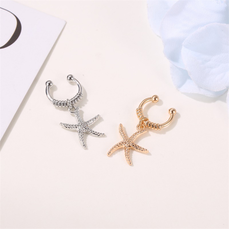 Boucles D&#39;oreilles Océan Vent Étoiles Pendentif Oreille Os Clip Simple Étoile De Mer Indolore Simple Oreille Clip En Gros Nihaojewelry display picture 4