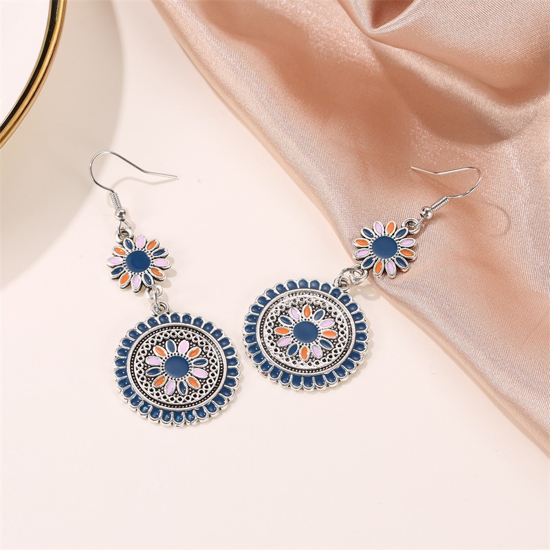 New Retro Palace Style Carved Metal Flower Totem Earrings Color Dripping Long Small Daisies Wholesale Nihaojewelry display picture 5